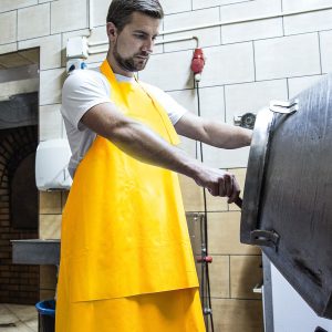 FARTUCH MASARSKI WODOODPORNY ZE WZMACNIANYM PRZODEM KOLOR ŻÓŁTY